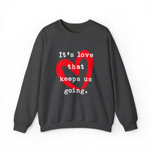 Load image into Gallery viewer, It&#39;s Love that Keeps Us Going - Graphic Print Unisex Heavy Blend™ Crewneck Sweatshirt
